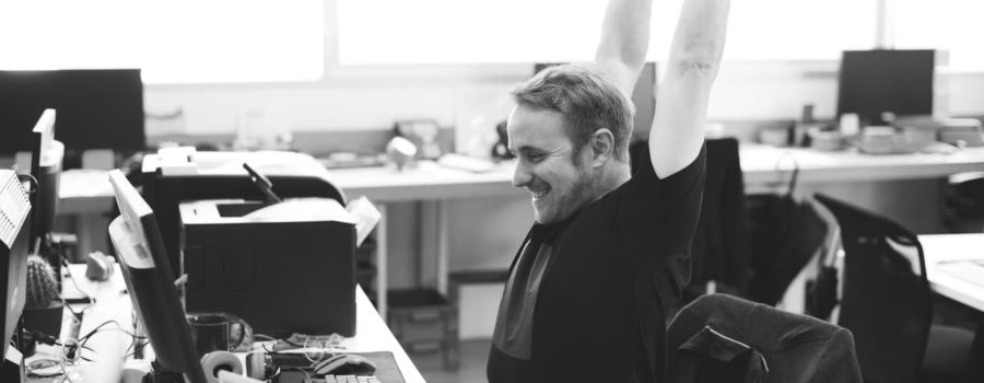 Simple Stretches You Can Do At Your Desk To Relieve Tension